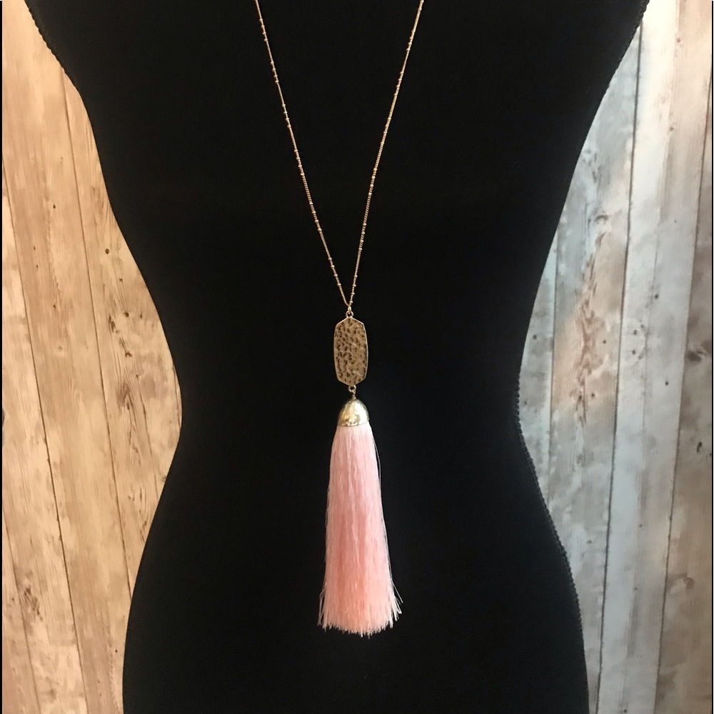 Gold tone tassel necklace